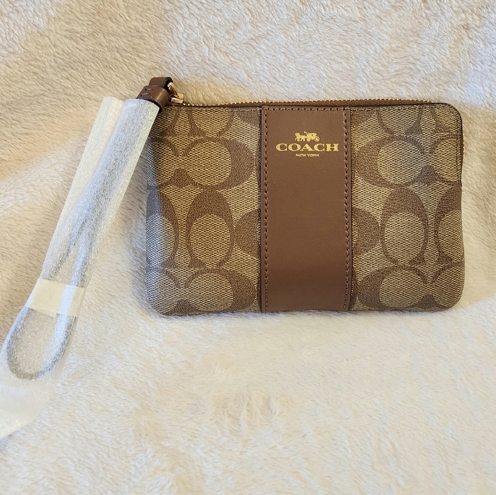 Coach Corner Zip Wristlet In Signature Canvas
